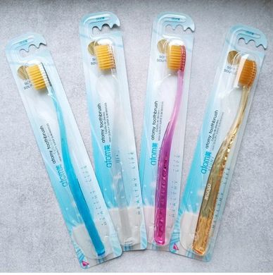 Антибактеріальна зубна щітка від Atomy з іонами золота. Південна Корея.